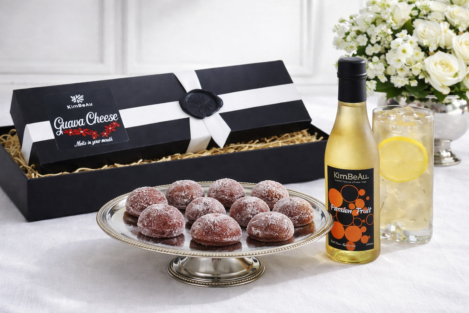 Discover the refined taste of KimBeAu Guava Cheese paired with refreshing Passion Fruit drink, presented in an elegant luxury setting. Premium Caribbean craftsmanship, rich flavour, and timeless indulgence.