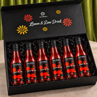 Premium KimBeAu Lemon & Lime Drink gift set with six bottles presented in an elegant black box.