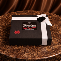Buy Online KimBeAu handcrafted nutty caramel chocolates are perfect for gifting on all occasions, beautifully presented in a black chocolate ribboned box  
