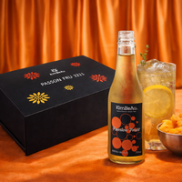 KimBeAu Passion Fruit Still Non-Alcoholic Drink 250ml bottle with iced glass and citrus garnish on silk backdrop