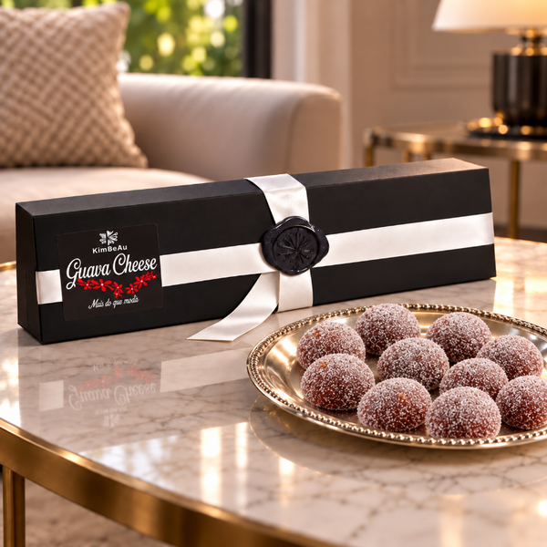 KimBeAu Guava Cheese box and round sugar-coated guava cheese pieces in an elegant living room setting, Pâte de Fruit.