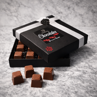 Buy Online Handcrafted KimBeAu chocolates displayed in an elegant black gift box which is outstanding