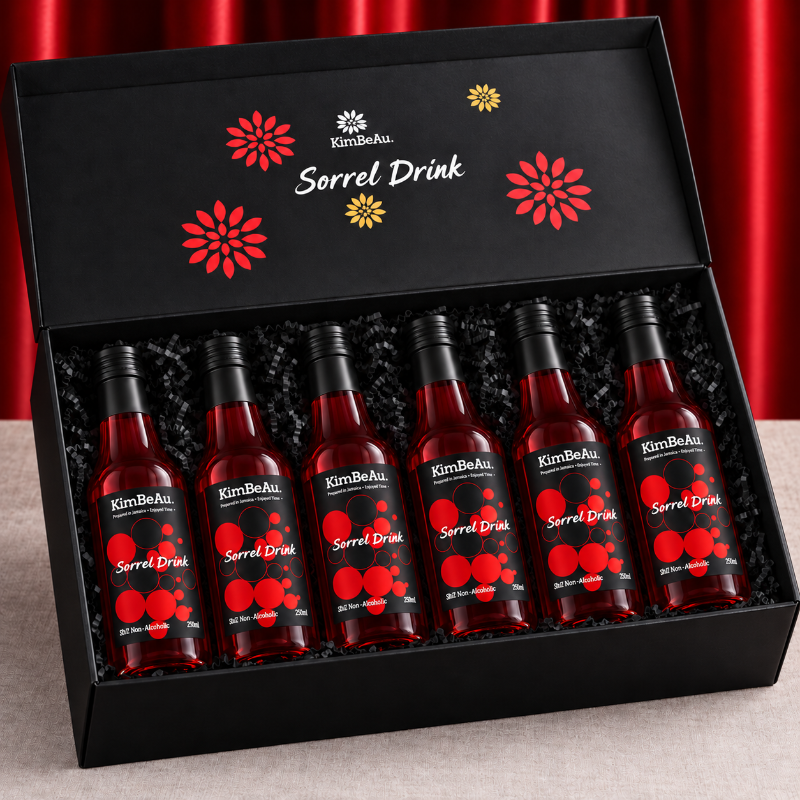 KimBeAu Sorrel Drink six bottle gift box with black caps and premium black shredded paper presentation.